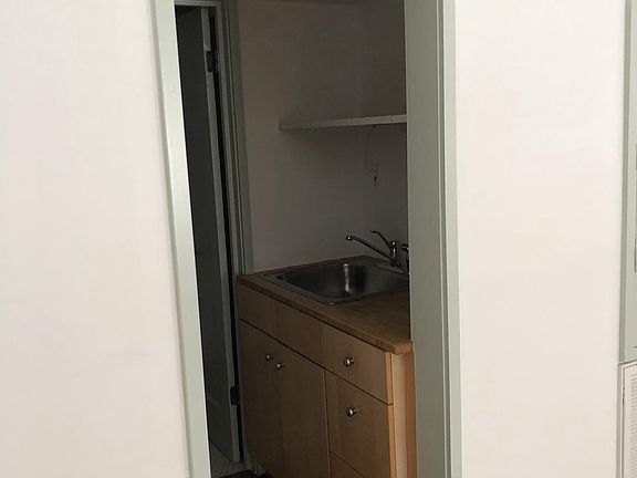 Looking into kitchenette.