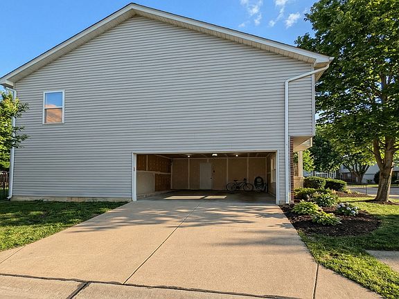 Side entry 2 car garage with car remote, and keyless entry on the garage door.