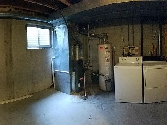 Storage room with washing machine and dryer