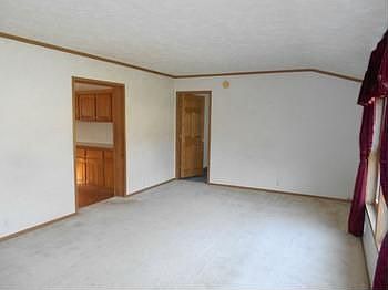 Oversized living room opens to master suite and to kitchendining room