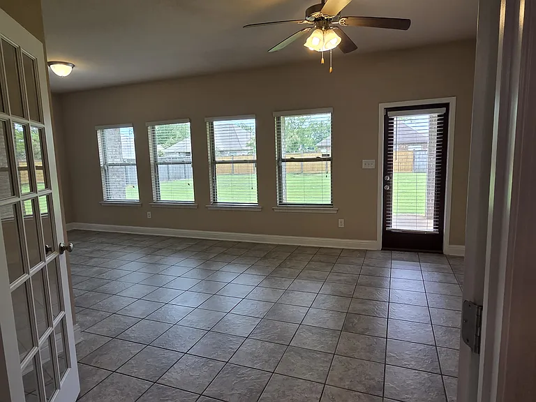 Enclosed back sunroom facing back yard