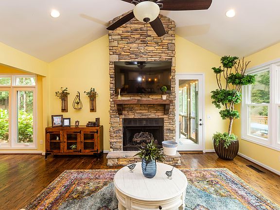 Image 4: Living Room with beautiful fireplace