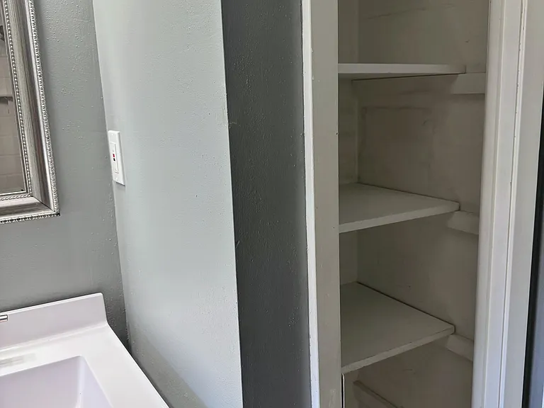 Upstairs bathroom closet