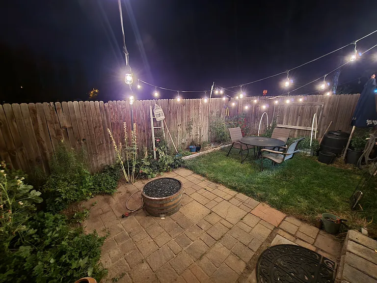 Plenty of flowers, grass to lounge in and room to grow veggies!