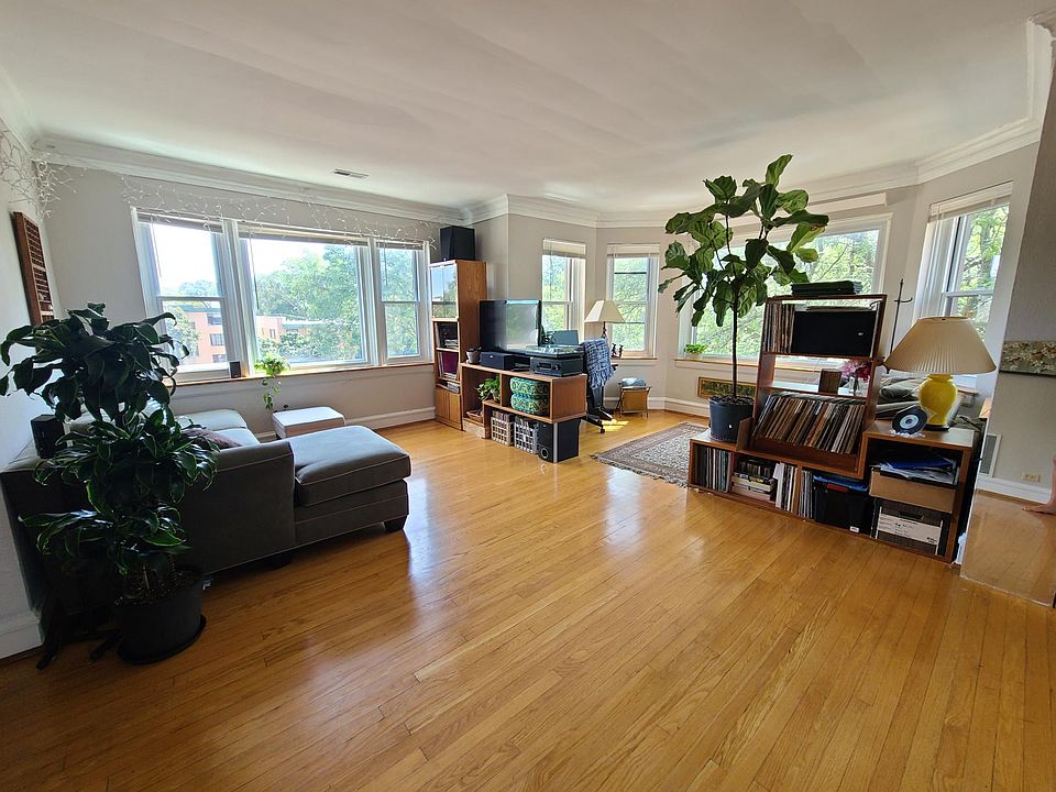 Living room. Lots of windows, light, and space.