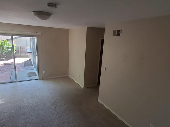 View of master bedroom taken with back to closet.