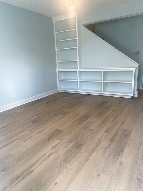 Living area with built-in bookshelves