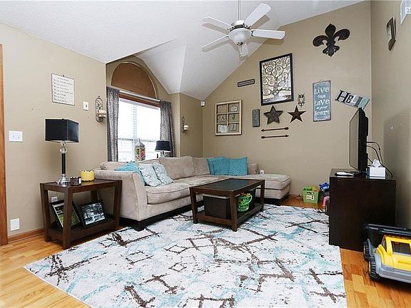 View back to see the front door and large window for the natural light.