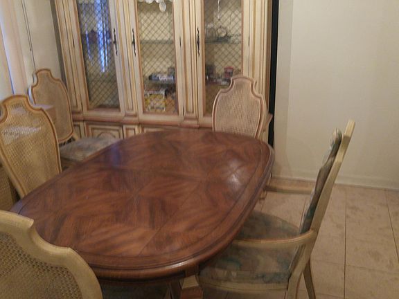 dining room table and chairs with storage