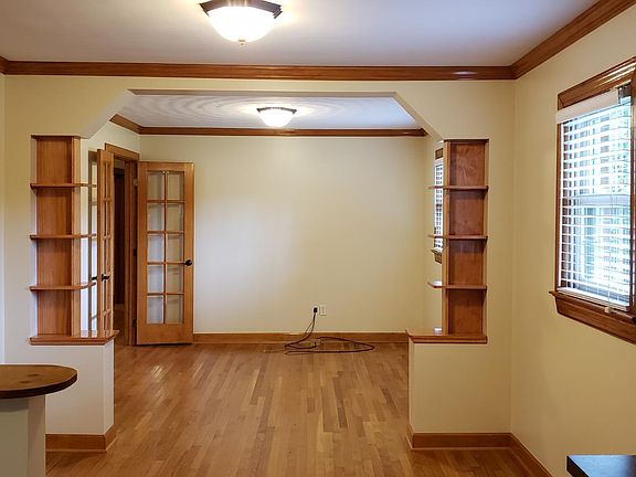 Dining area open to den and kitchen