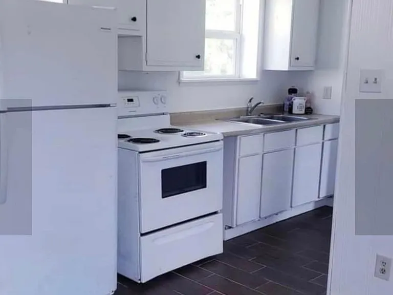 This unit offers new flooring throughout