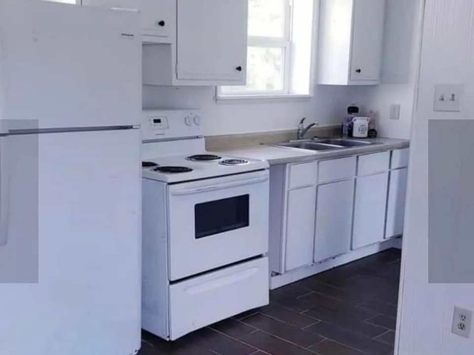 This unit offers new flooring throughout