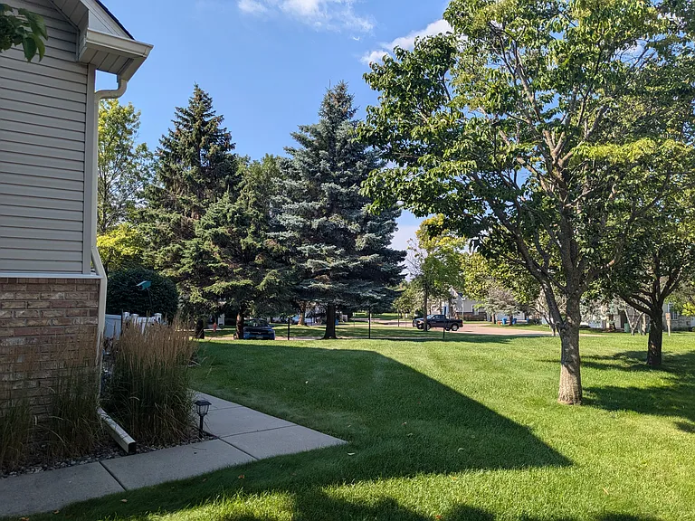 The townhome community adjoins Carver Lake Park and Beach