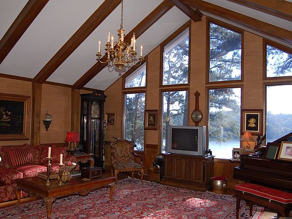 Family Room with Vaulted Ceiling and View of River
