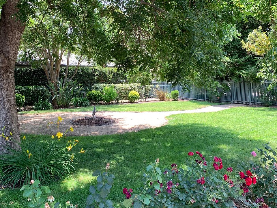 Beautifully maintained private grounds with gated garage parking.