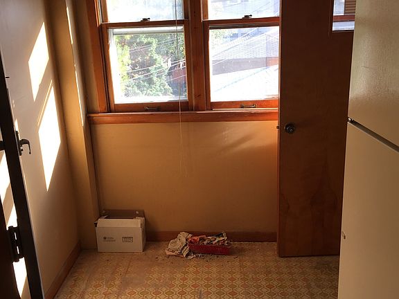 Enclosed Sun Porch and Back Entrance