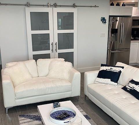 living room - barn door to Den