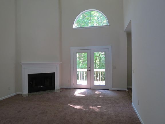 Family room looking to wooded back yard.