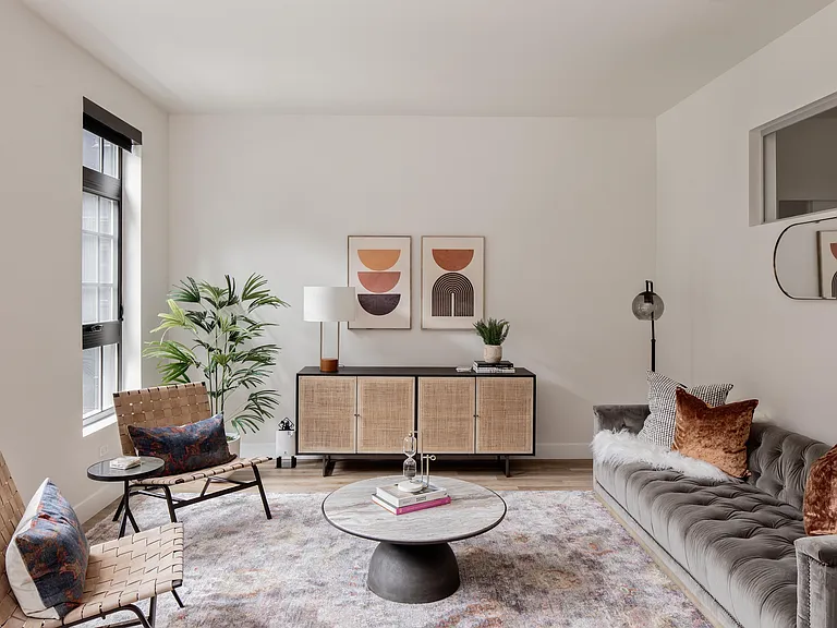 Open layout living area flooded with natural light