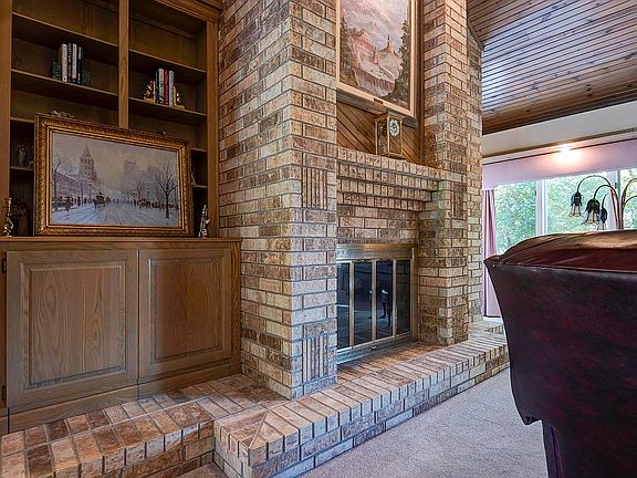 Brick wood burning fireplace