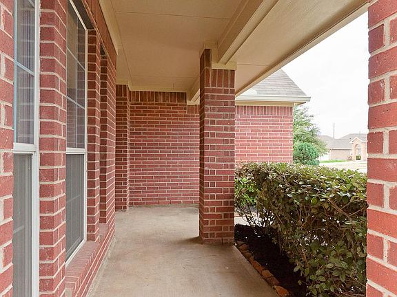 The covered front porch measures 20' x 9'. offering plenty of room for outdoor furniture.
