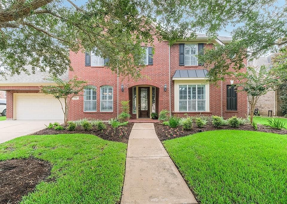 Welcome Home to beautiful 7931 Emerald Haven Drive nestled into a cul de sac lot in the family friendly subdivison of Woodhaven.