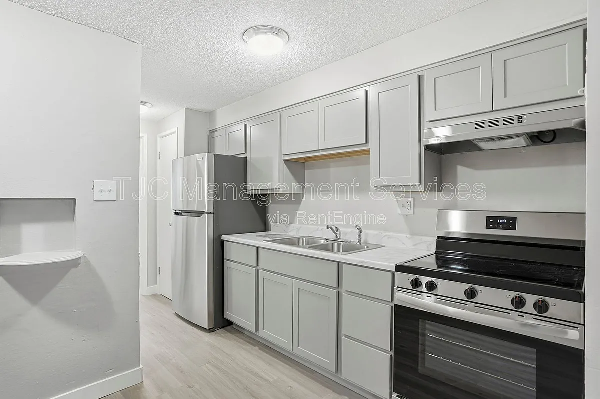 Building Photo - 1341 N Ogden St #302