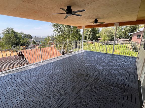 Back deck with great views (can access from primary bedroom and sliding door in second living area).
