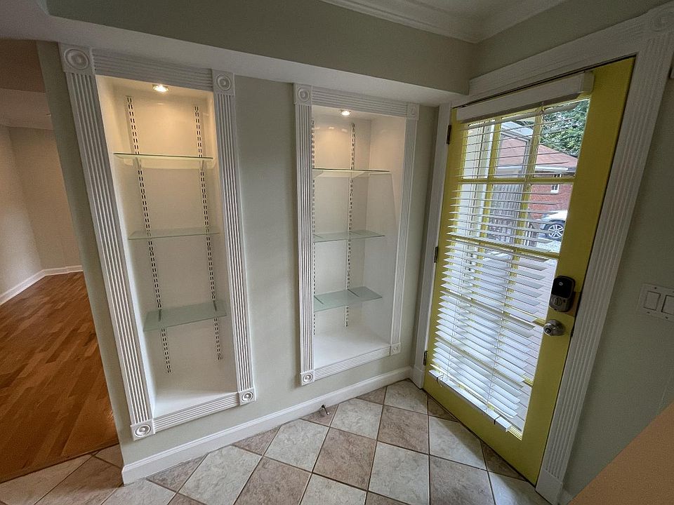 Main Door. Lighted Shelves