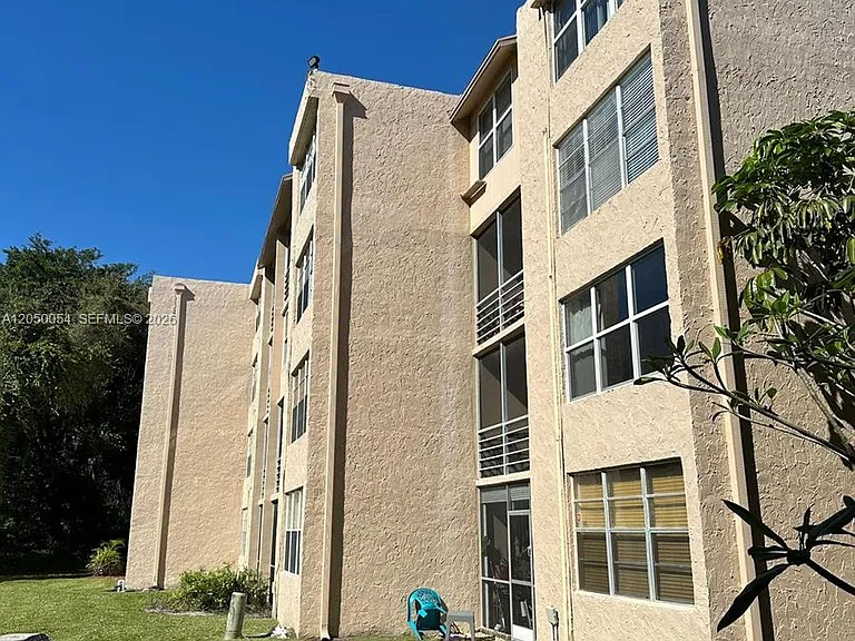 9410 Live Oak Pl #305 — Photo 1