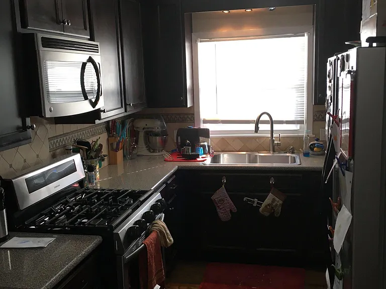 Updated Kitchen with gas stove and stainless steel appliances!