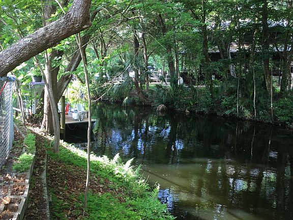 View from the covered pavilion with the outdoor kitchen.