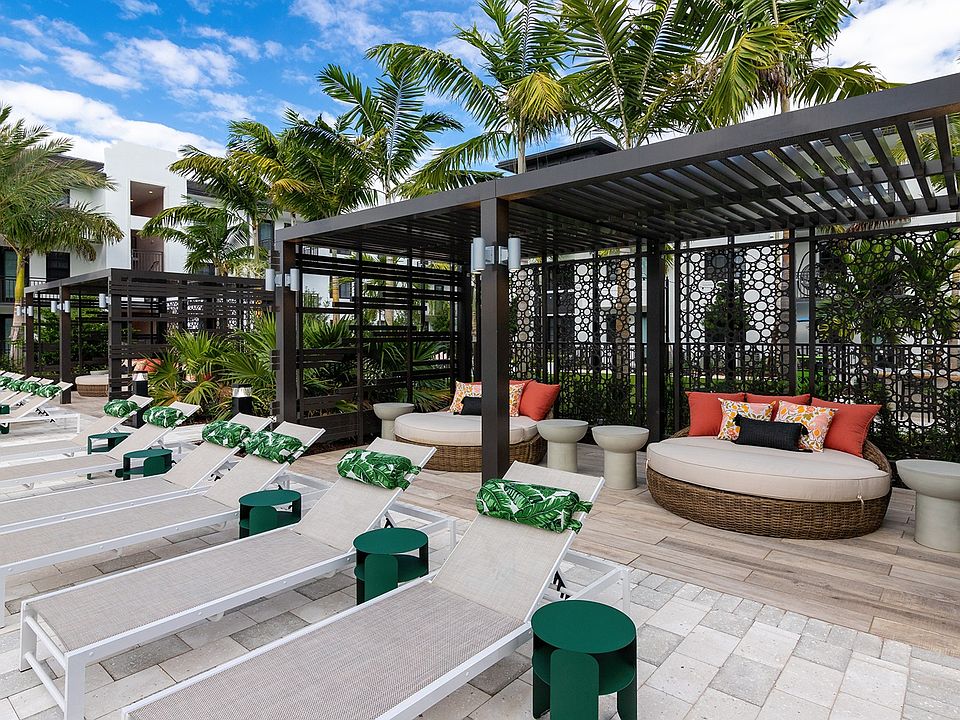 Rest and recharge at the poolside cabanas