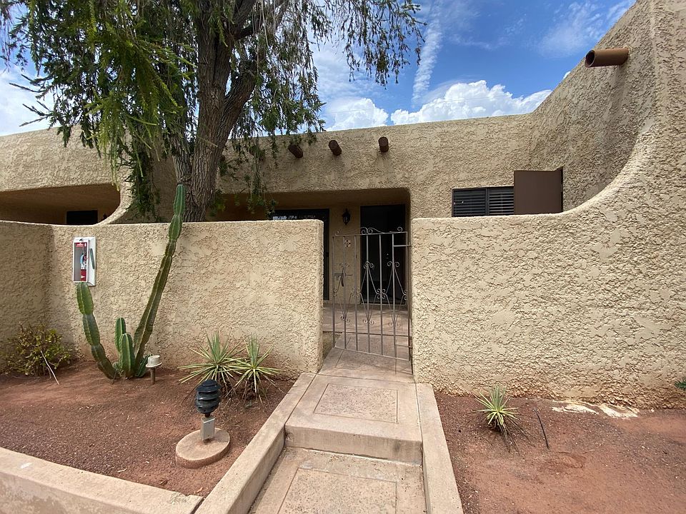 Front of Apartment with private gated patio