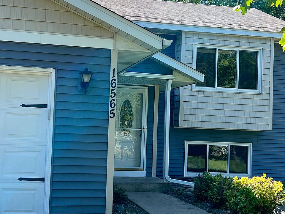 Front with 2 car garage