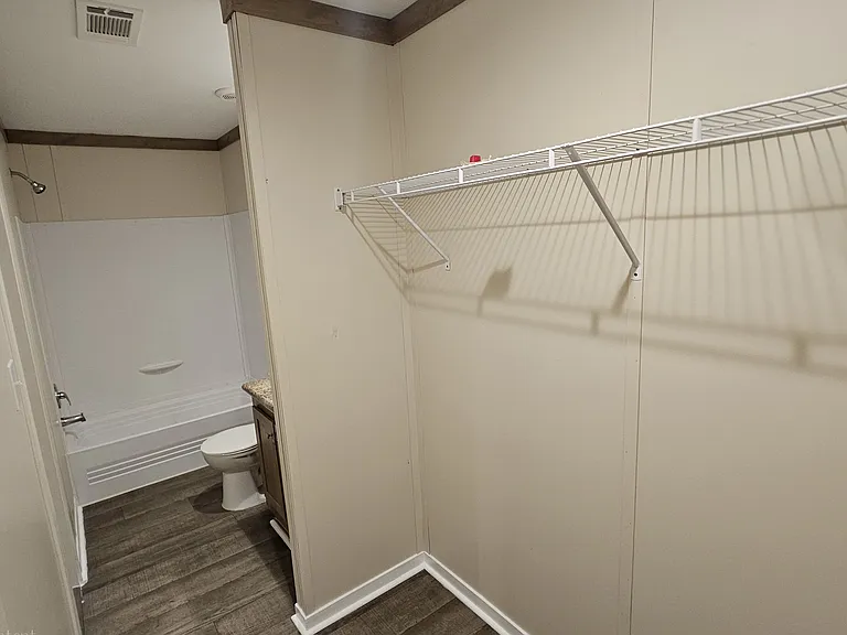 Master bedroom closet and bathroom.