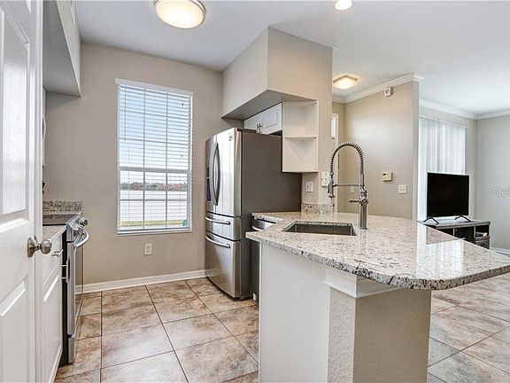 5th image of 9316 Lake Chase Island Way #9316