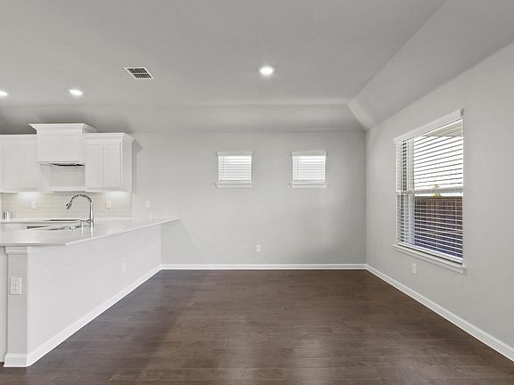 Dining room in the Grammy home plan by Trophy Signature Homes