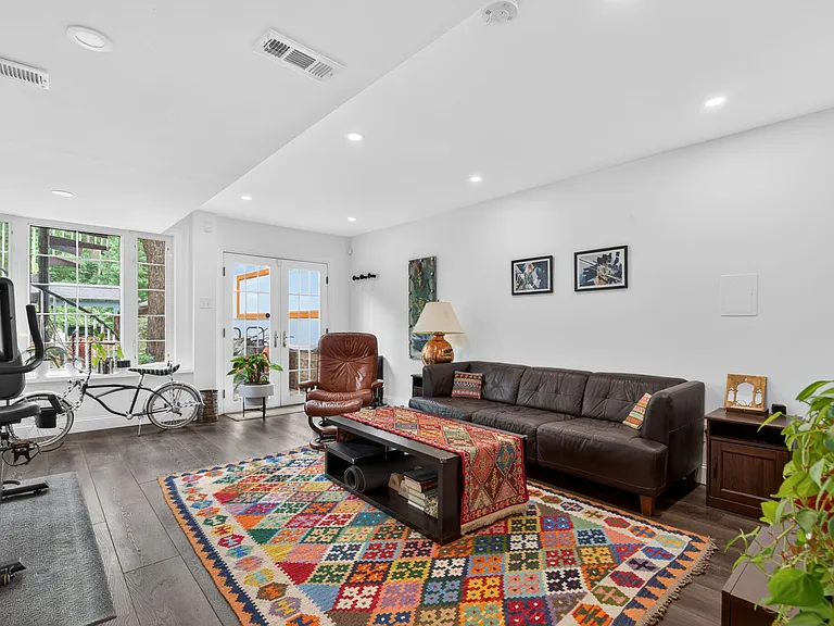 Lower Level Living Room With Walkout to Backyard