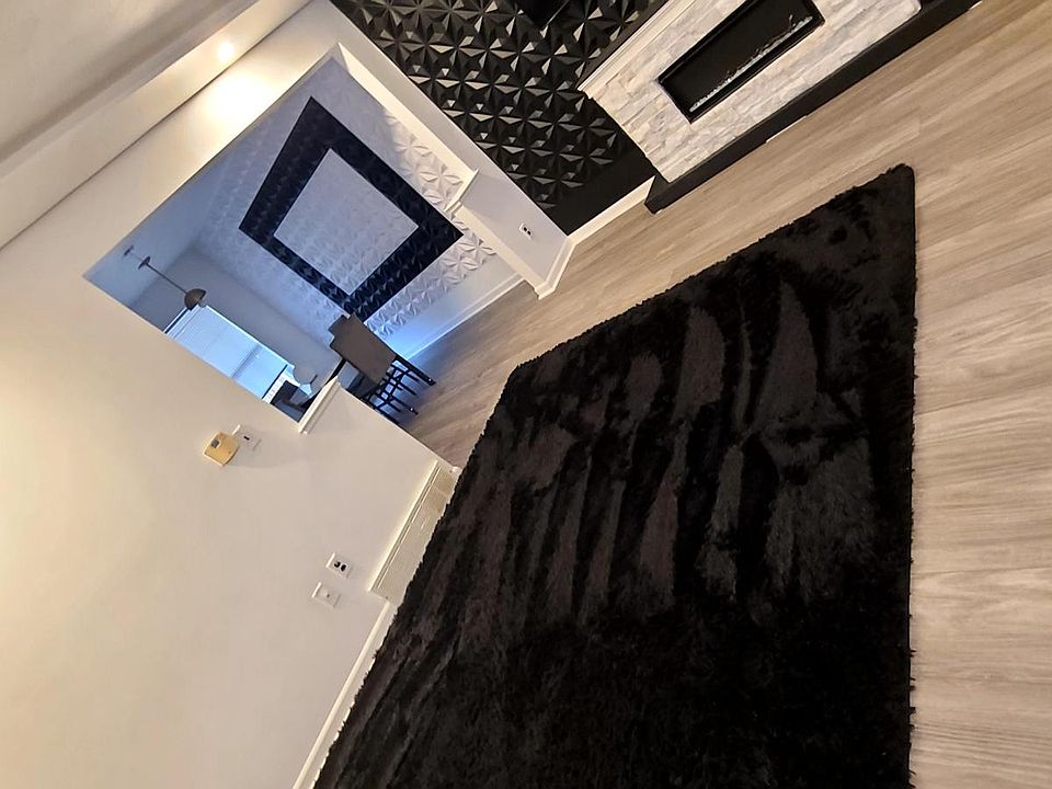 Living Room + Crown molding with light