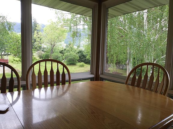 dining room with picture windows