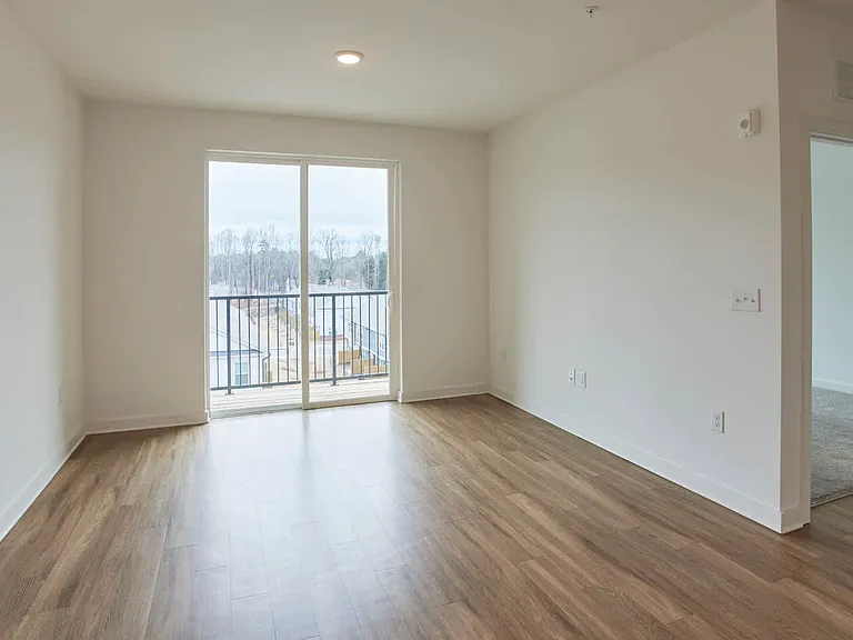 Living Room with Balcony and Hard Surface Flooring