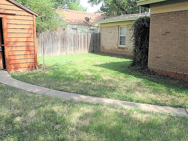 Storage shed in backyard
