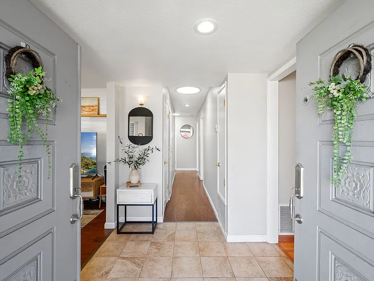 Double door entrance & skylight all throughout the house