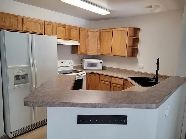 10734 W 63rd Pl #302 — Photo 7