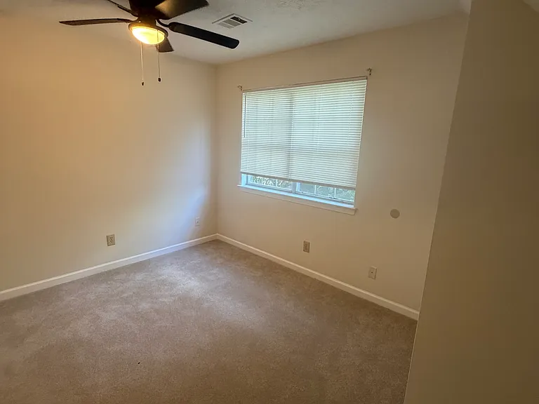 Second bedroom with ceiling fan