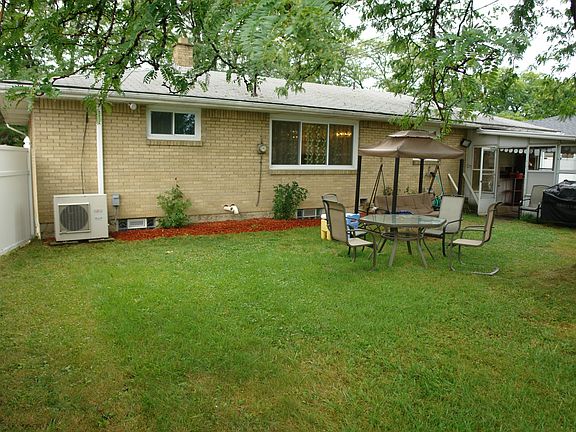 Backyard with AC in view