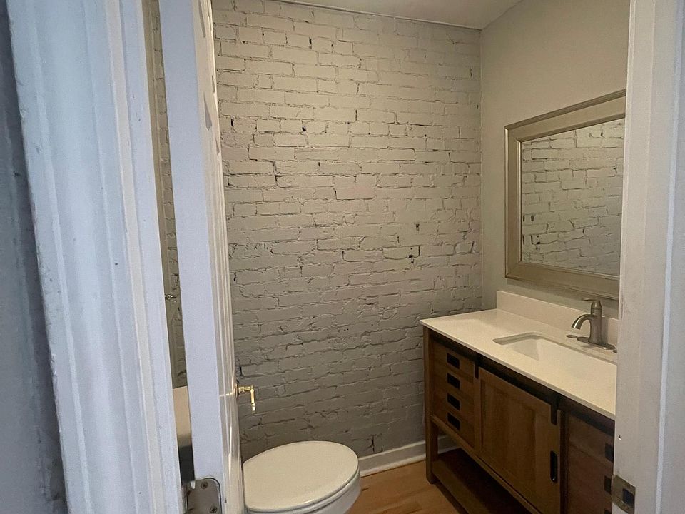 Newly renovated half bath on the first floor