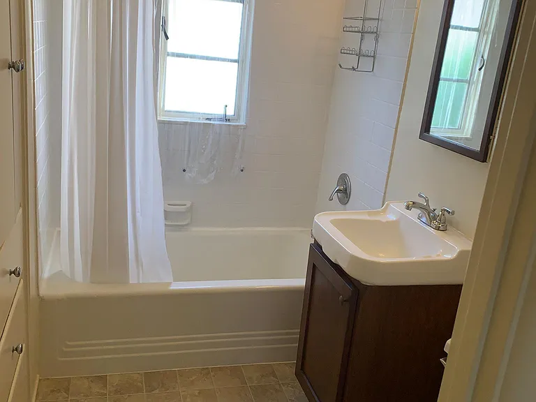 Newer vanity sink with walnut finish