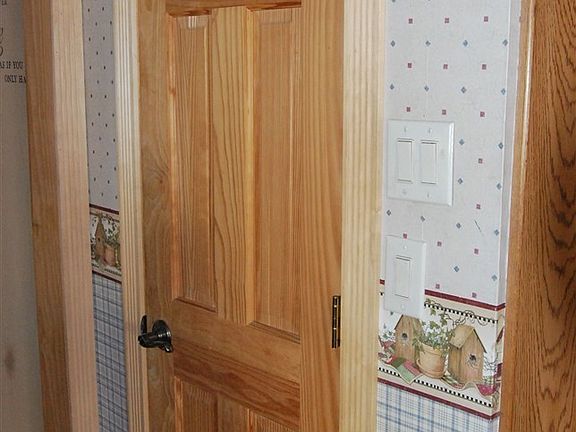 Doors have been updated recently to 6 panel doors. Oak.